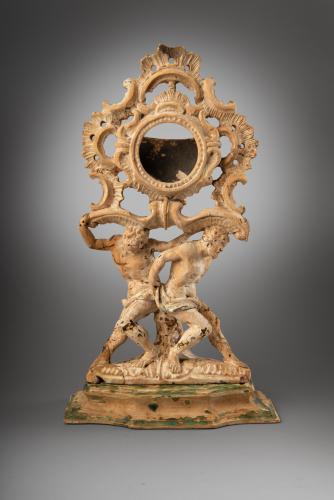 Careworn carved pine watch stand in the form of Time borne-aloft by Atlas and Hercules